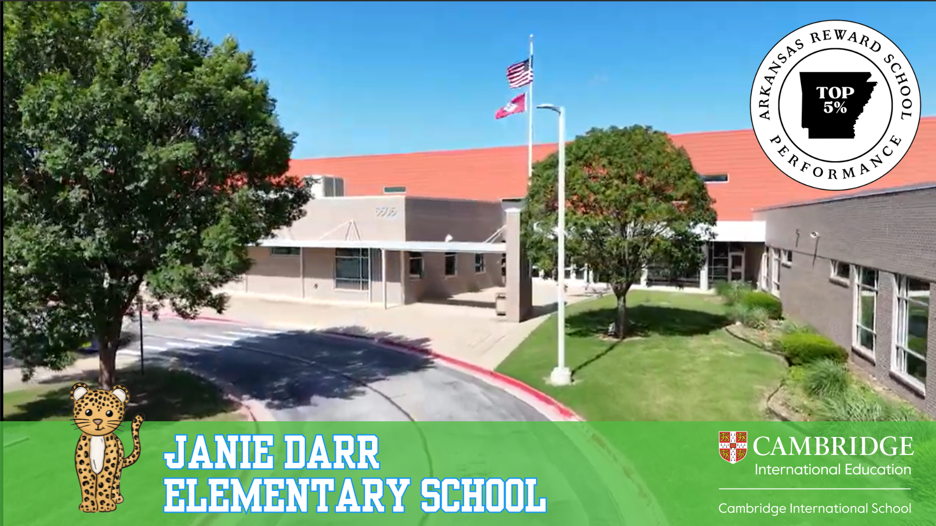 Exterior view of Janie Darr Elementary School with its logo, name, and accolades.